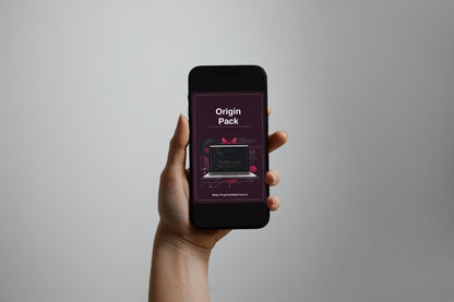 Hand holding a smartphone displaying an 'Origin Pack' on a gray background